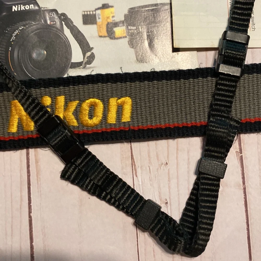 Vintage retro Nikon camera N50 strap and lens cover 1994 accessories